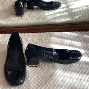 Tory Burch Black Patent Leather block heel with gold accent on heel